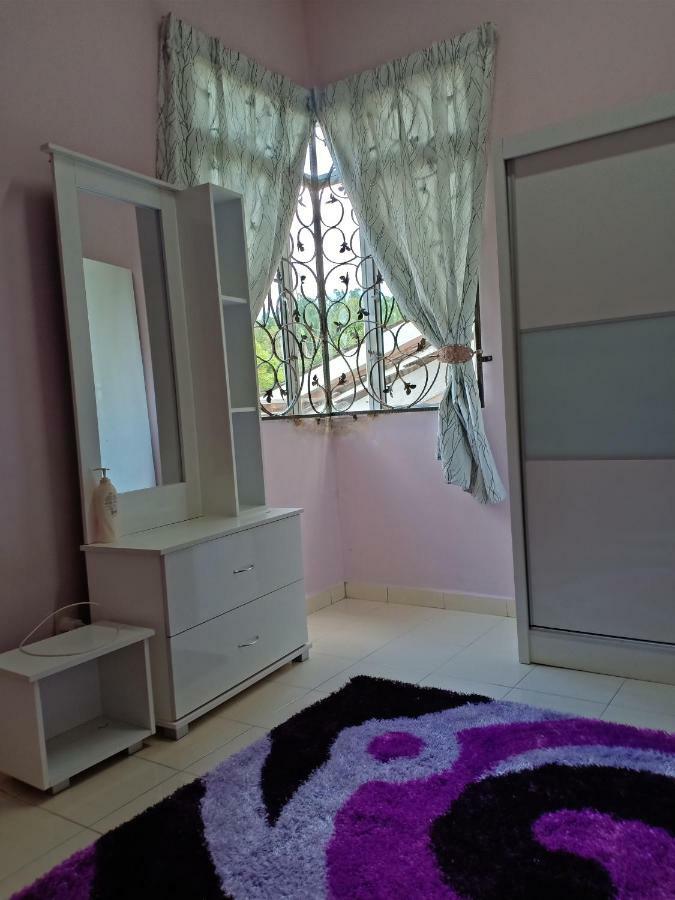 Muslim Dinaim Homestay Tanjong Malim Esterno foto